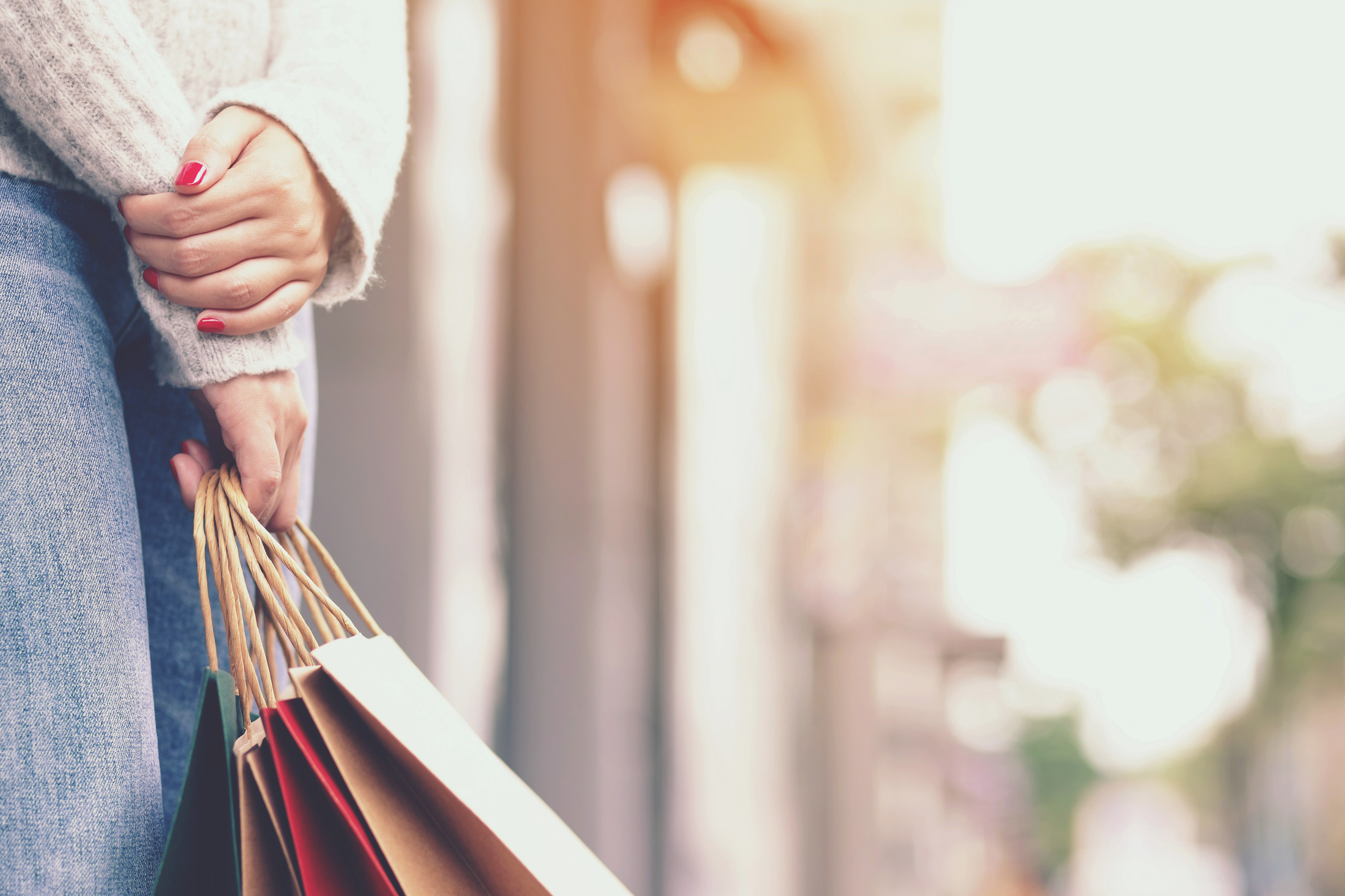 Woman Holding Shopping Bags